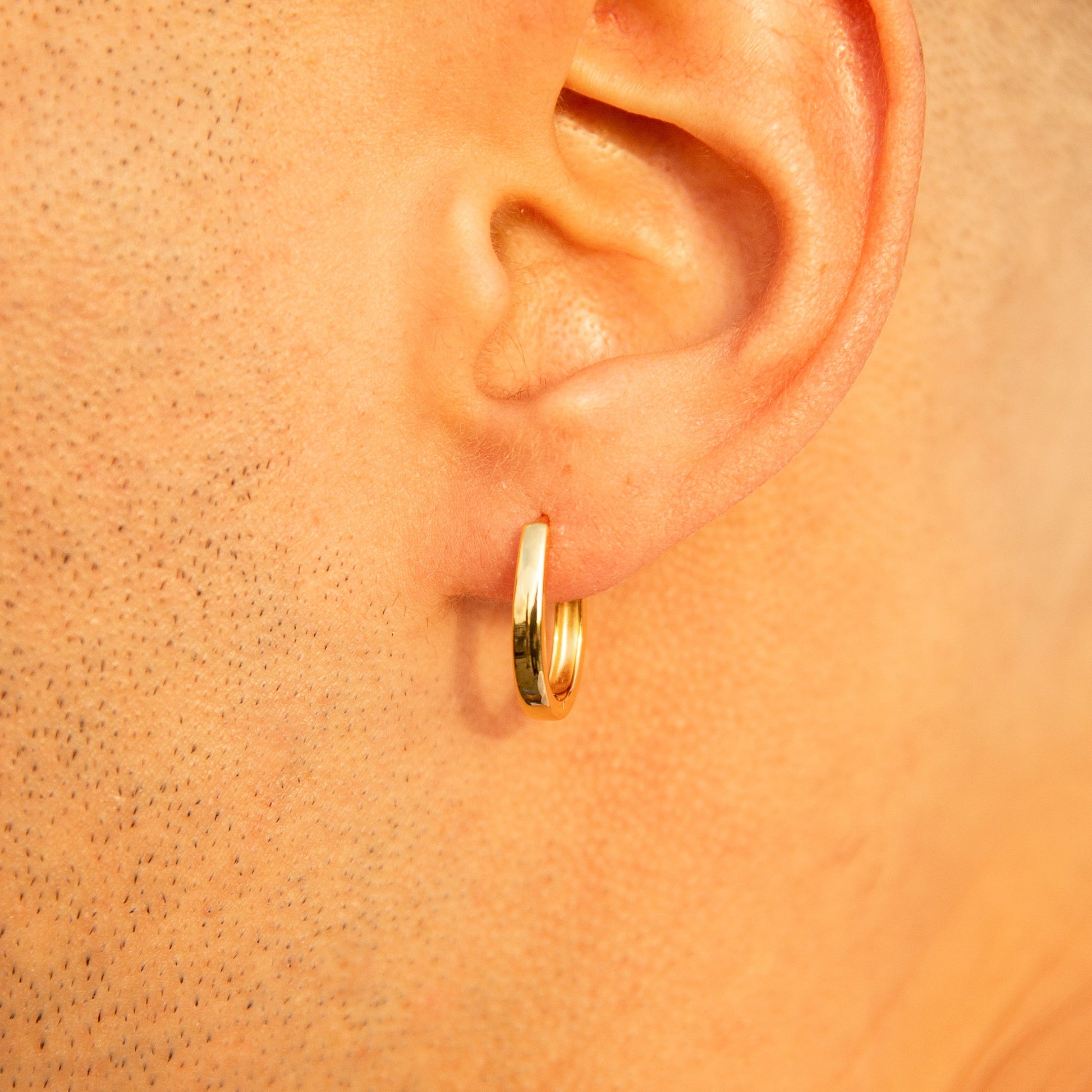 Oval Huggie Gold U Hoops U Shape Horseshoe Shaped Hoop Earrings by Doviana