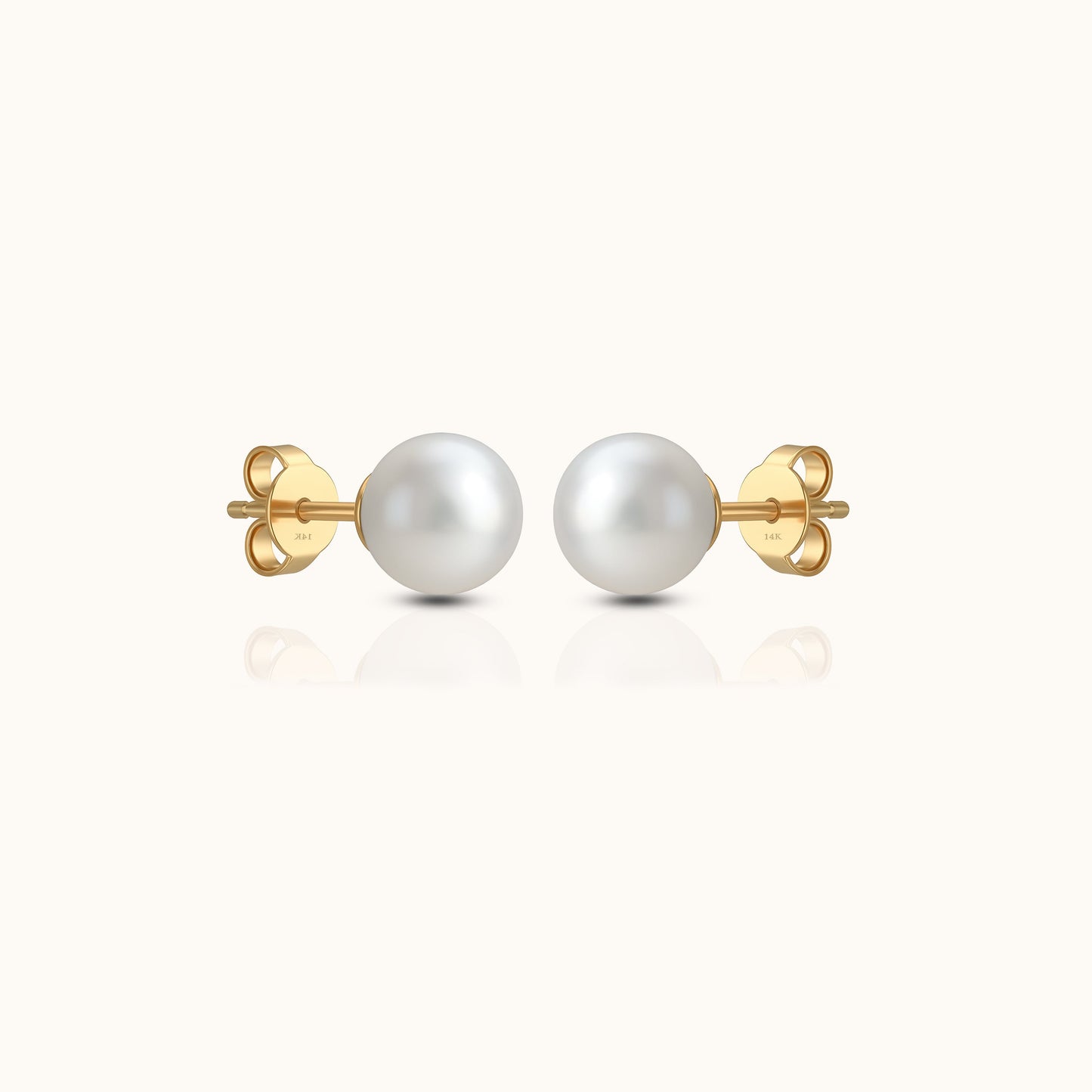 Soft, luminous, and forever refined — the Ever Grace studs capture the quiet beauty of timeless elegance. Featuring two perfectly round Akoya pearls set in 14K solid gold, this pair radiates natural luster and effortless charm. A symbol of grace and love, they are the perfect accents for everyday wear, bridal moments, or meaningful gifting.