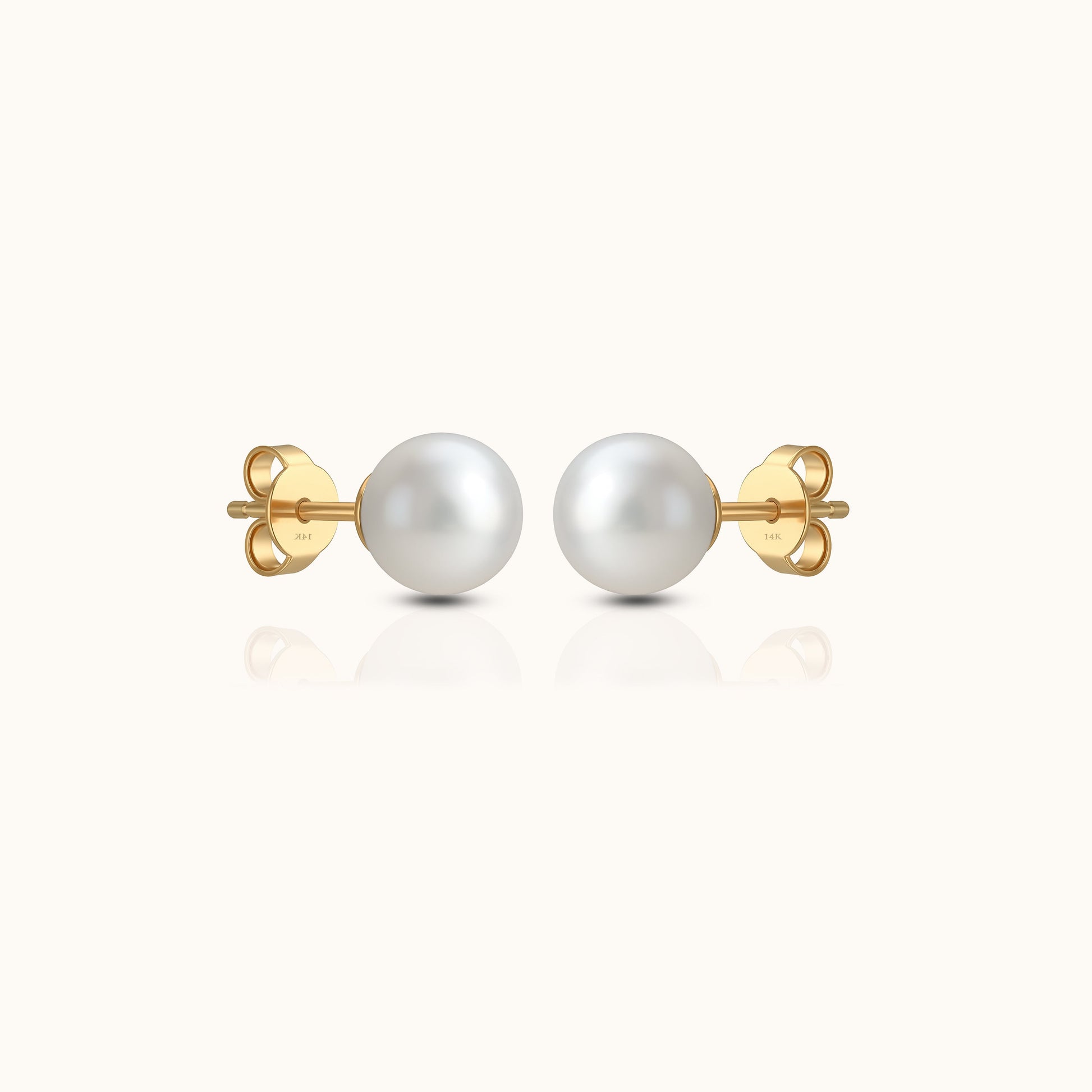 Soft, luminous, and forever refined — the Ever Grace studs capture the quiet beauty of timeless elegance. Featuring two perfectly round Akoya pearls set in 14K solid gold, this pair radiates natural luster and effortless charm. A symbol of grace and love, they are the perfect accents for everyday wear, bridal moments, or meaningful gifting.