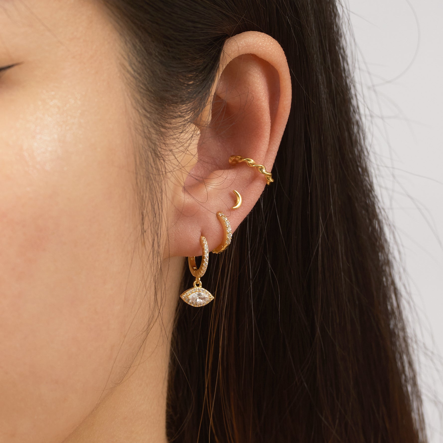 Gold Protector Wide White Eye Dangle Eye CZ Pave Huggie Hoop Earrings by Doviana