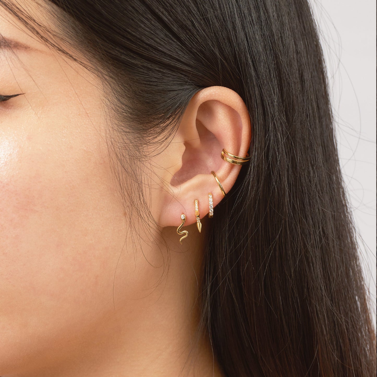 Petite Sleek Serpent Charm Animal Lover Mini Gold Snake Stud Earrings by Doviana