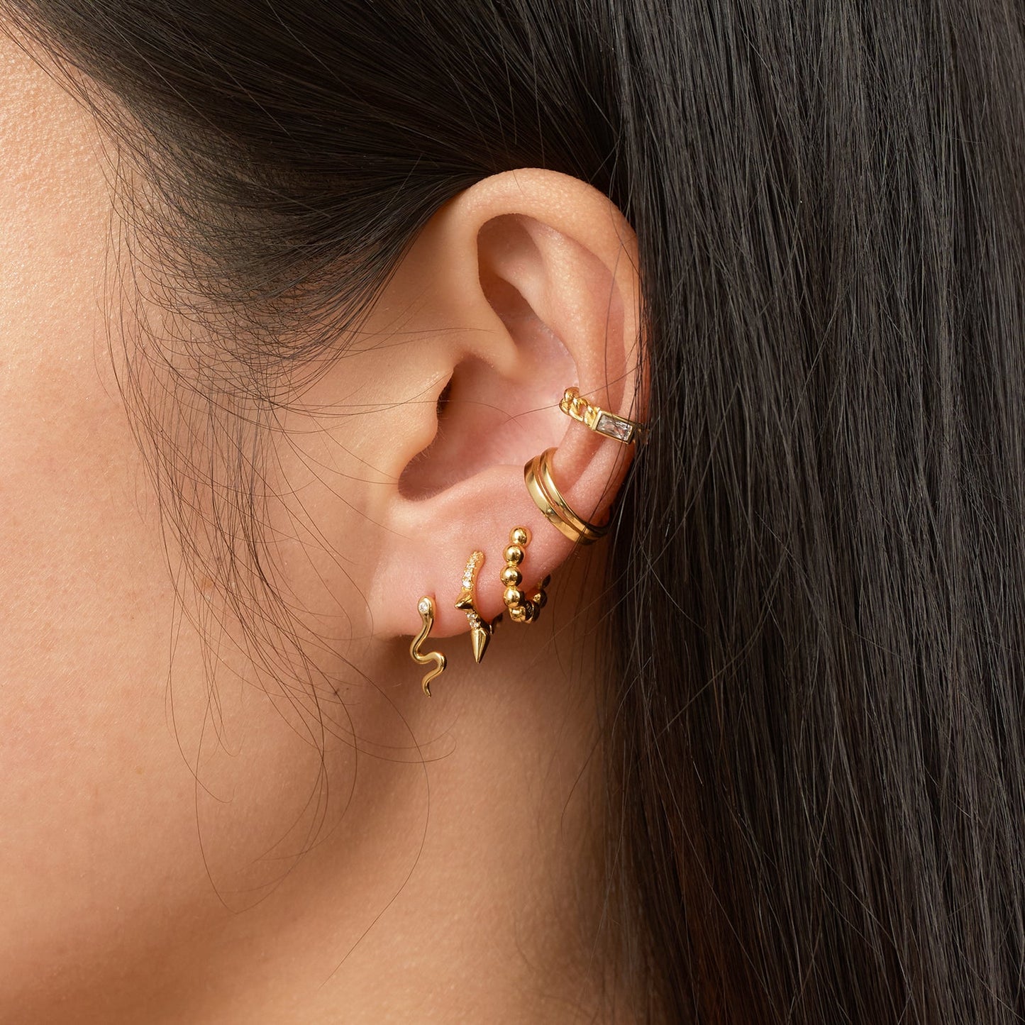 Petite Sleek Serpent Charm Animal Lover Mini Gold Snake Stud Earrings by Doviana