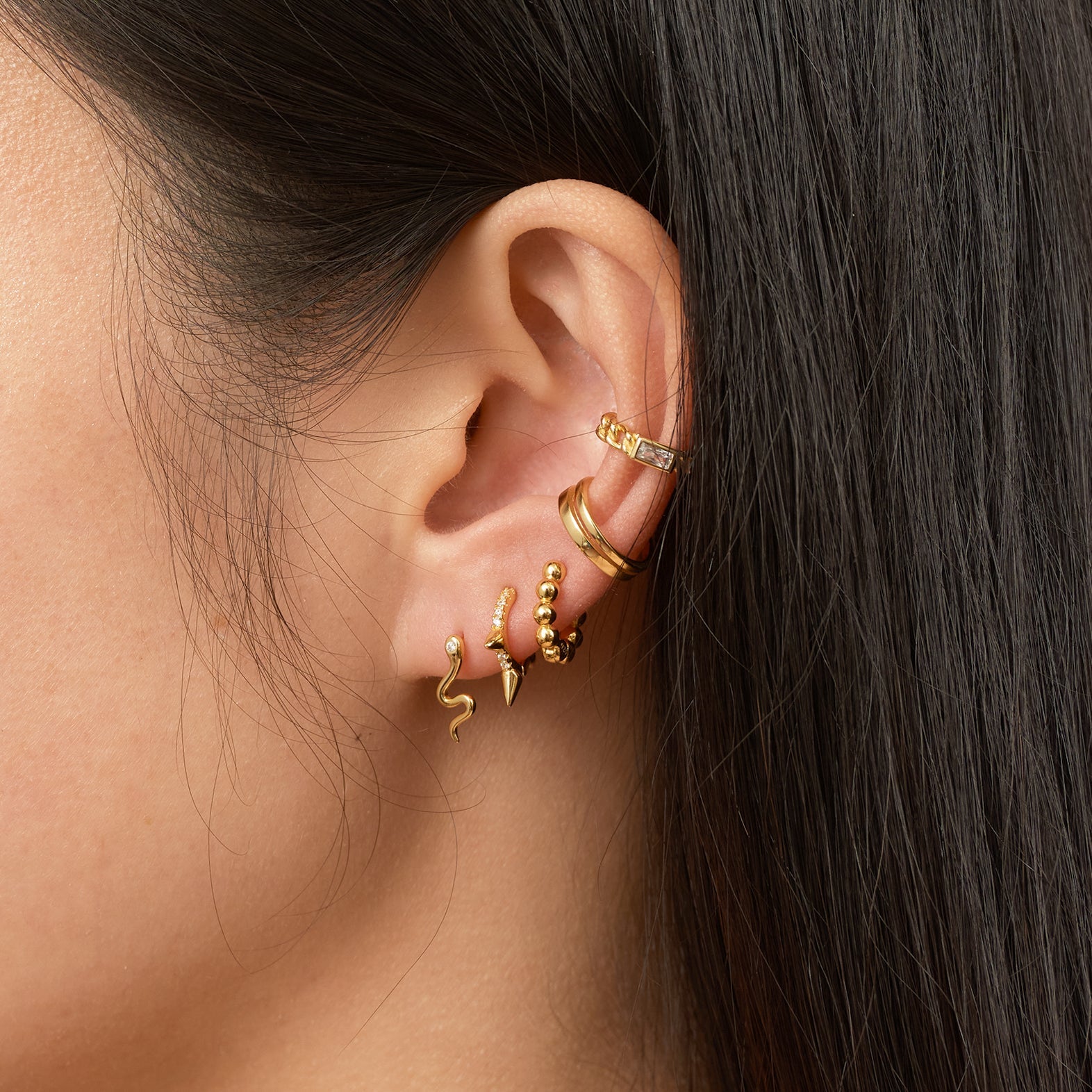 Petite Triple Spikes Huggie Hoops Tiny Gold Spike CZ Hoop Earrings by Doviana