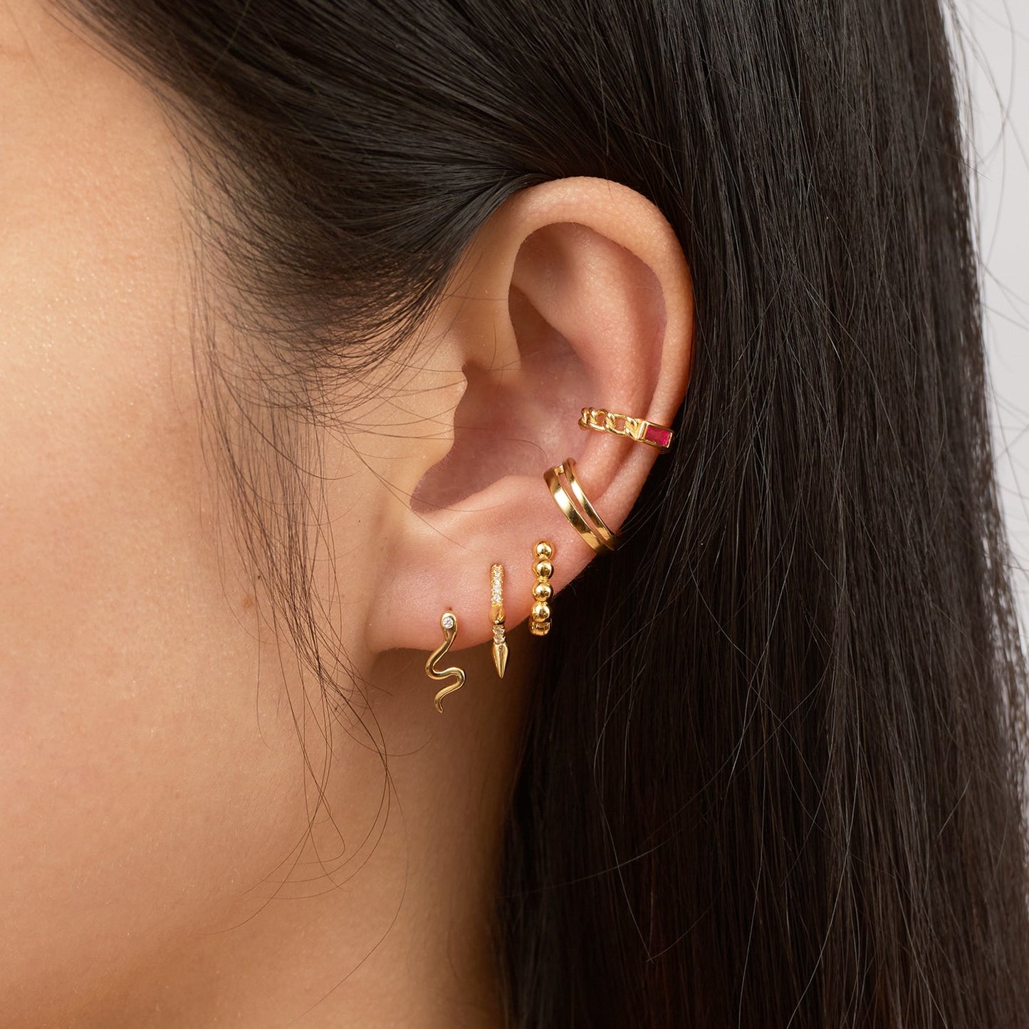 Petite Sleek Serpent Charm Animal Lover Mini Gold Snake Stud Earrings by Doviana