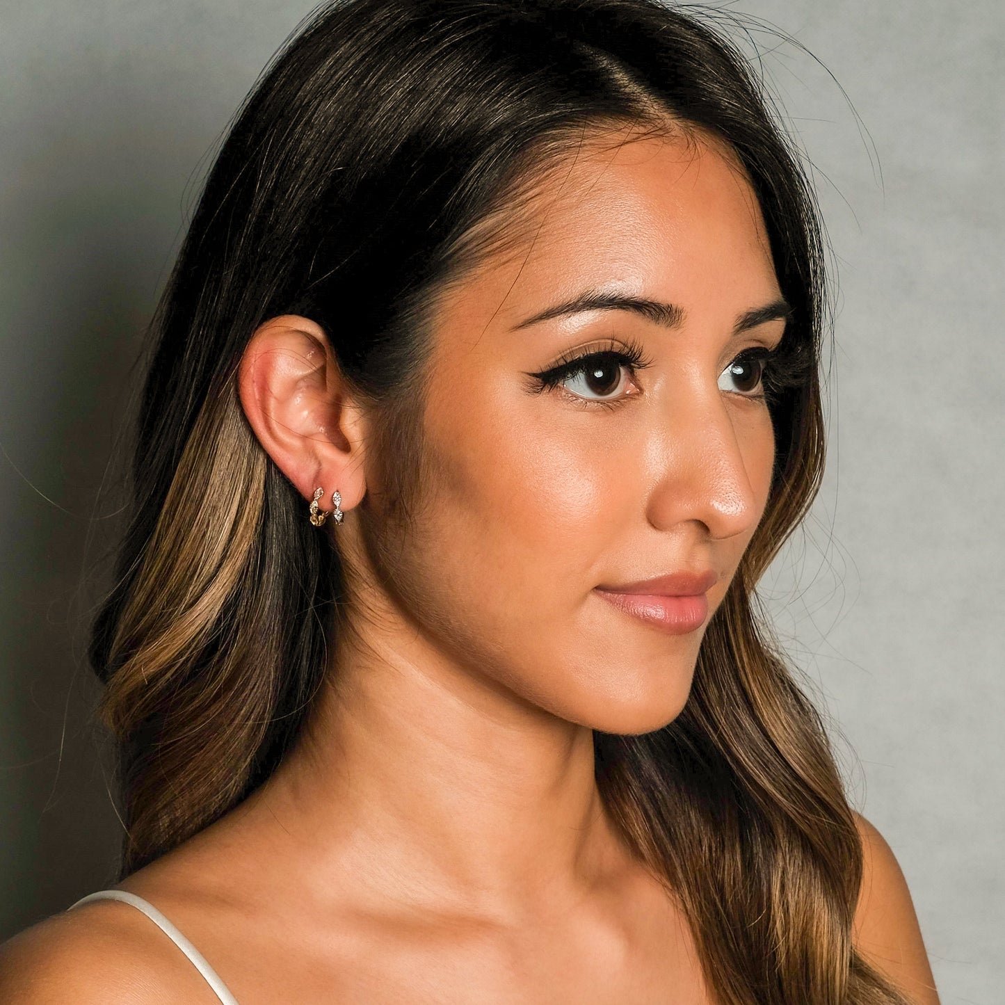 Petite Gold CZ Hoops Tiny Oval Huggie Hoop Earrings by Doviana