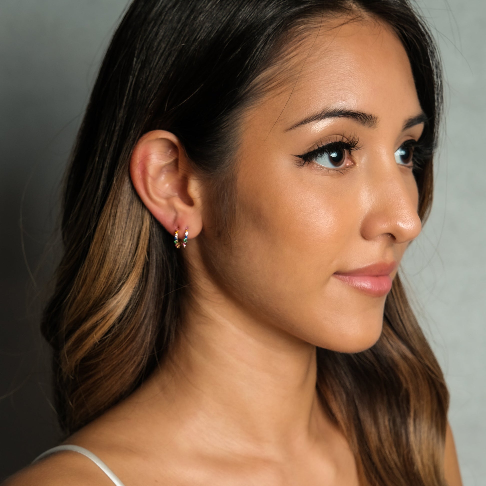 Multicolored CZ Tiny Hoop Earrings Rainbow Shiny 18K Gold Huggie Hoops by Doviana