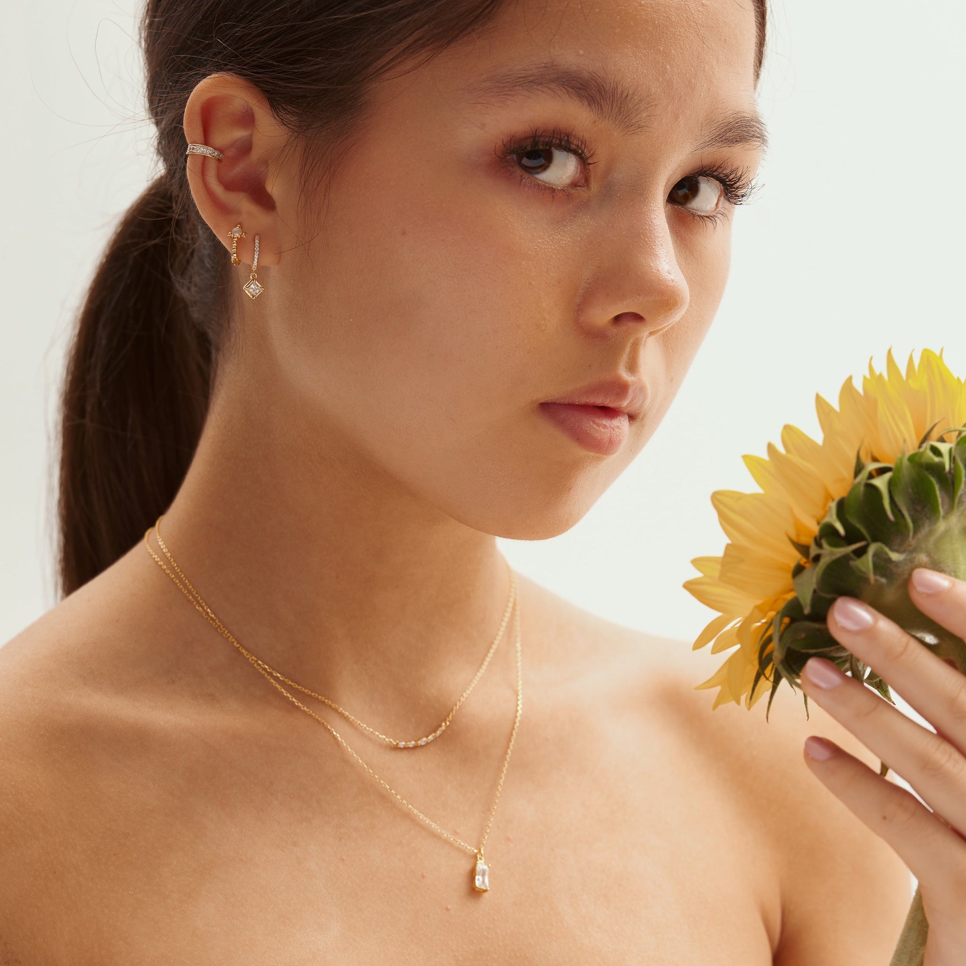 Delicate Natural Gold Gemstone Huggie Hoops Gem Bow Opal Hoop Earrings by Doviana
