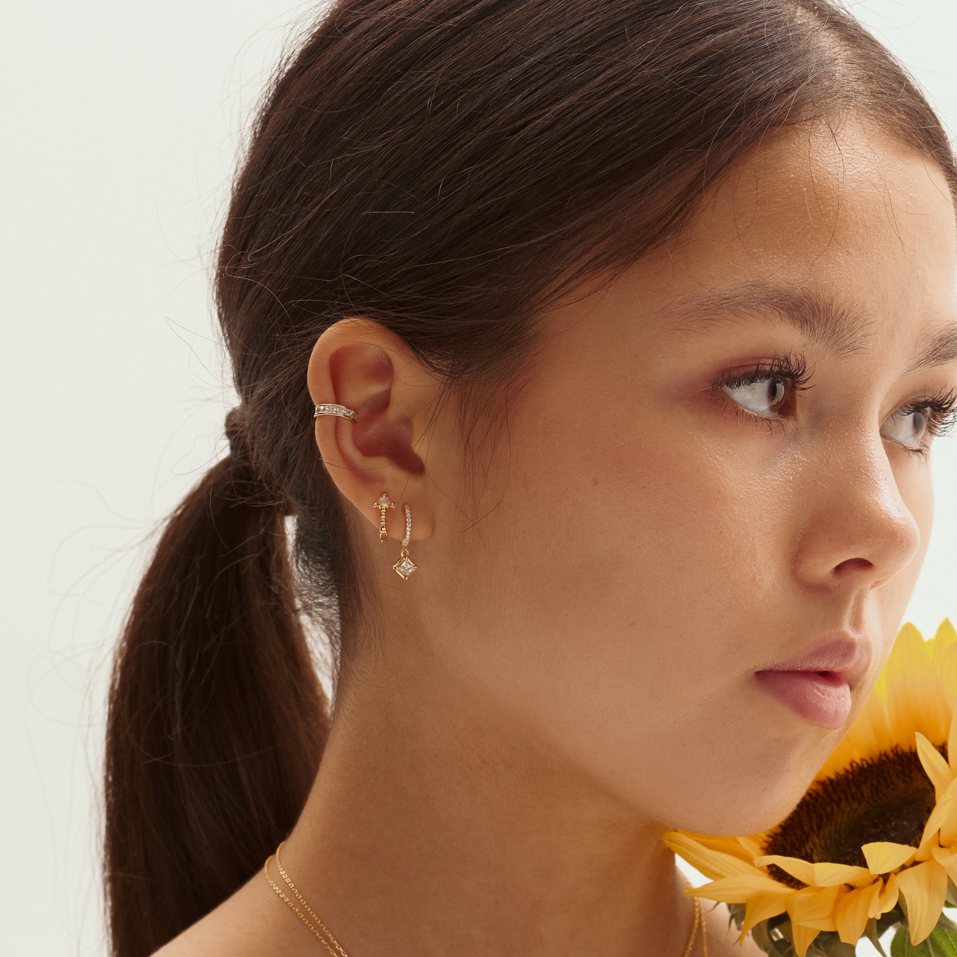 Delicate Natural Gold Gemstone Huggie Hoops Gem Bow Opal Hoop Earrings by Doviana