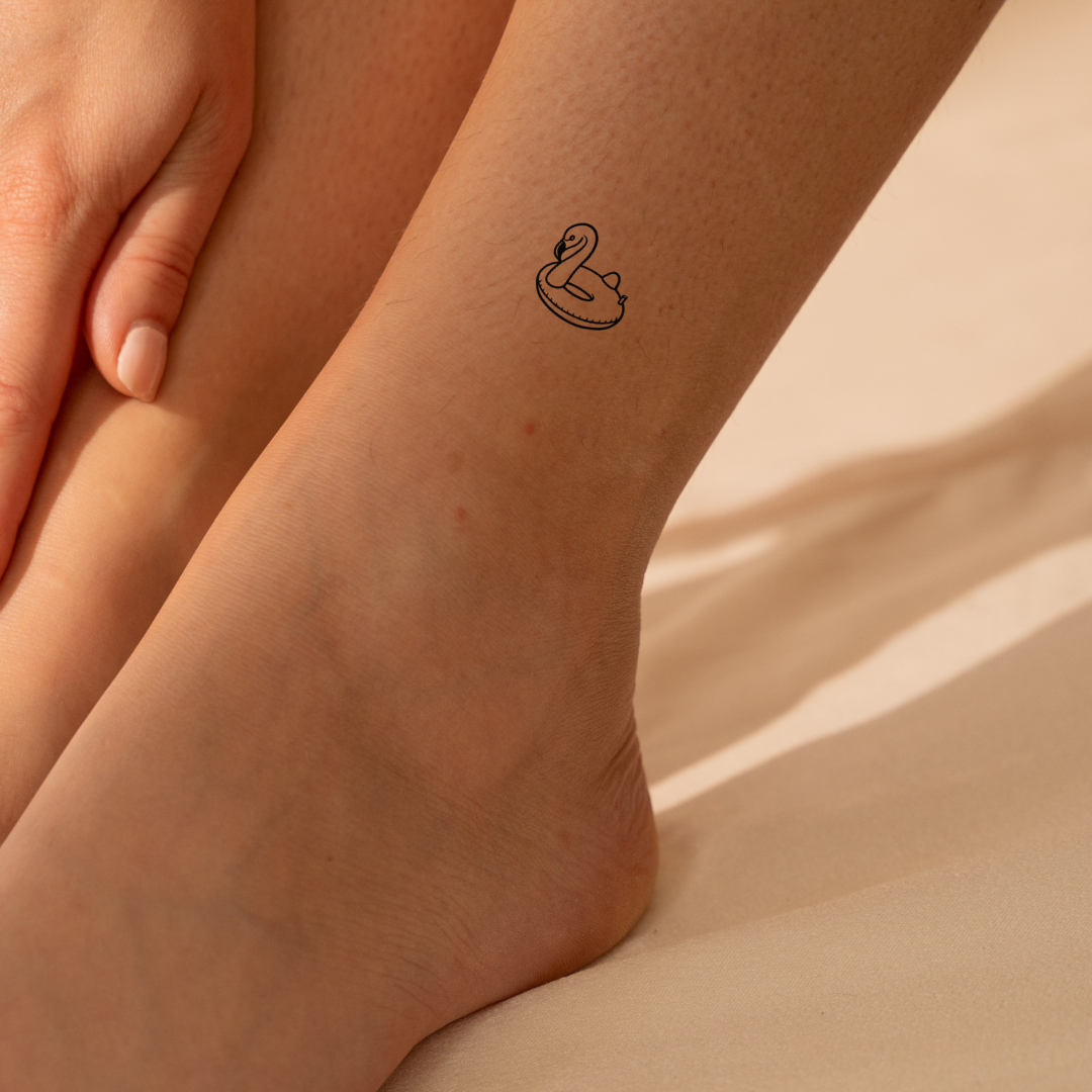 Flamingo Float — A Splash of Fun & Sunshine by DOVIANA Tattoo Studio (length 0.5‘’)