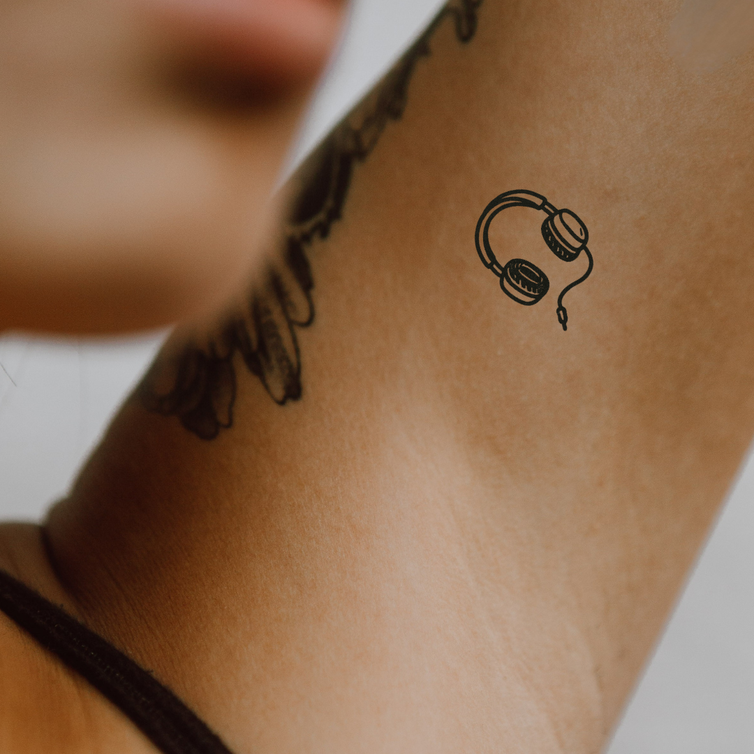 Headphones - A Symbol of Rhythm & Self-Expression  by DOVIANA Tattoo Studio (width 0.4‘’)