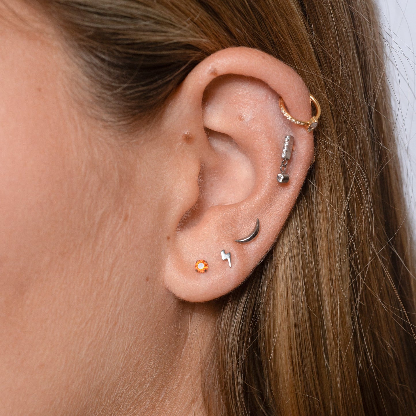 Solitaire Oval CZ Pave Clicker Titanium PVD Gold Hinged Nap Hoop Earring by Doviana