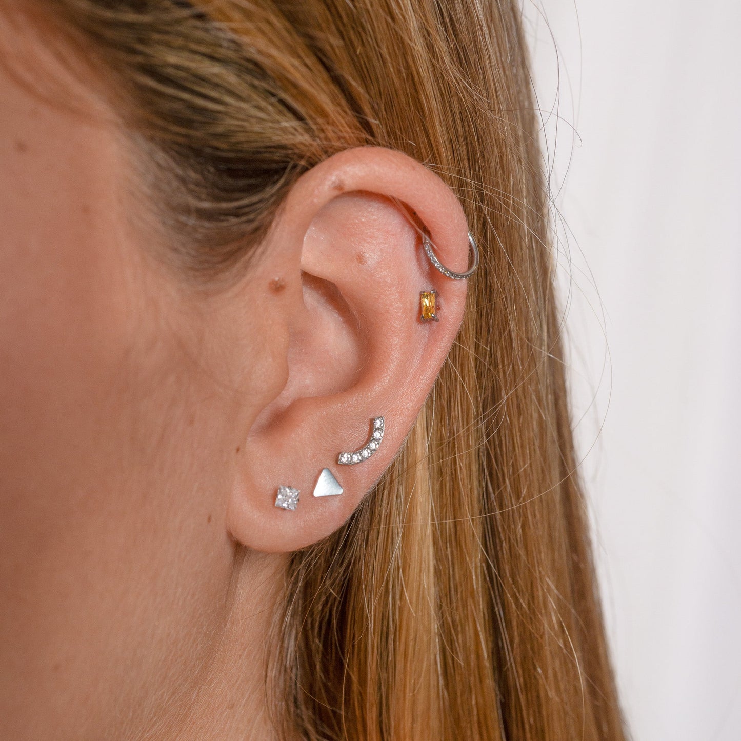 Pyramid Edgy Gear Medical Grade Titanium Hinged Nap Huggie Hoop Earring by Doviana
