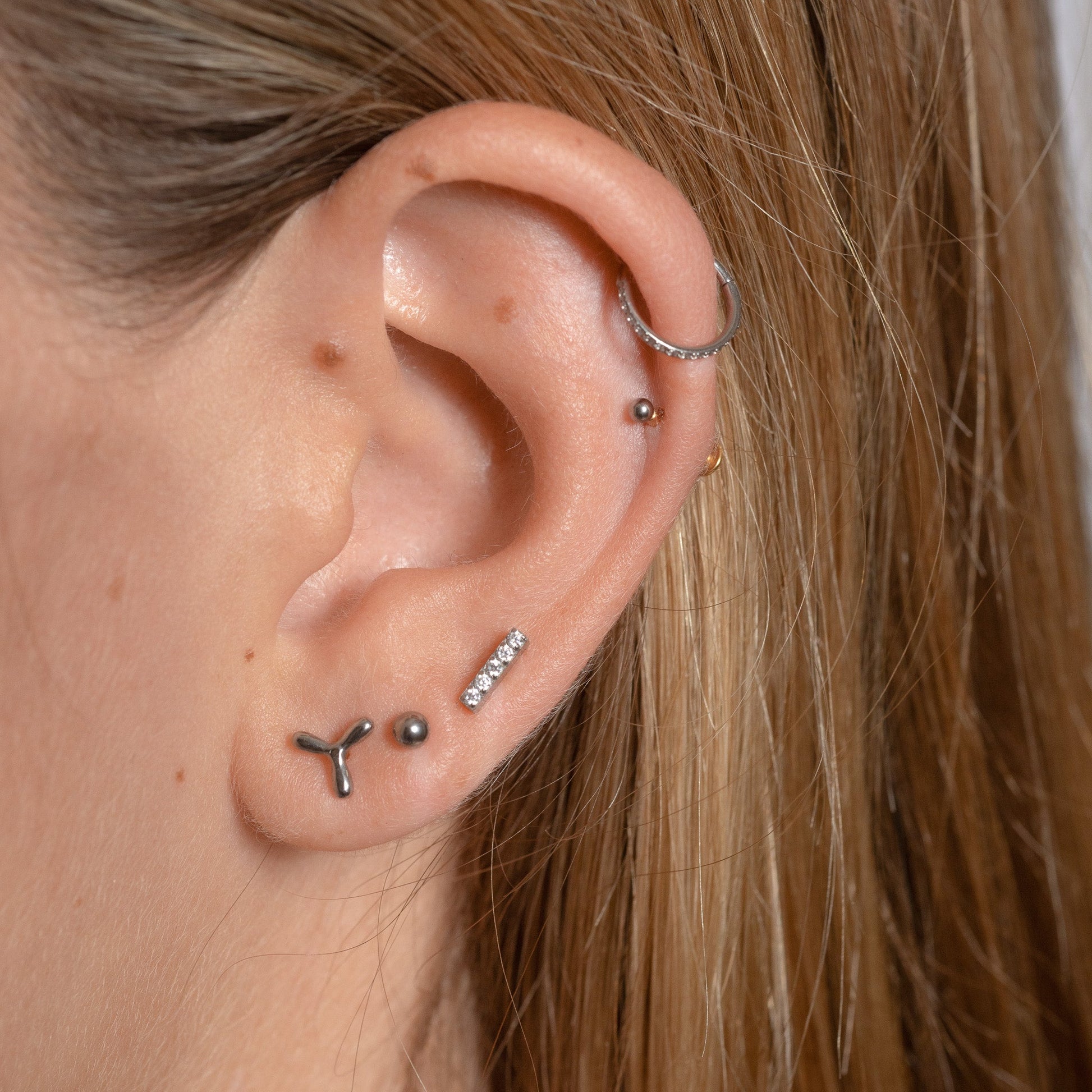 Boomerang Valve Threadless Labret Titanium Flat Push Back Nap Earring by Doviana